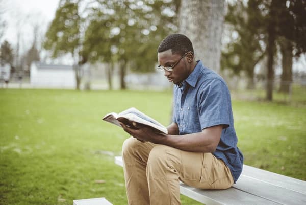 A person reading quietly.